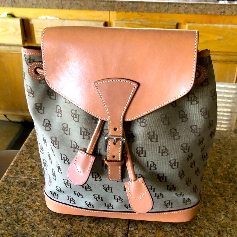 Dooney & Bourke Buckle Closure Backpacks |